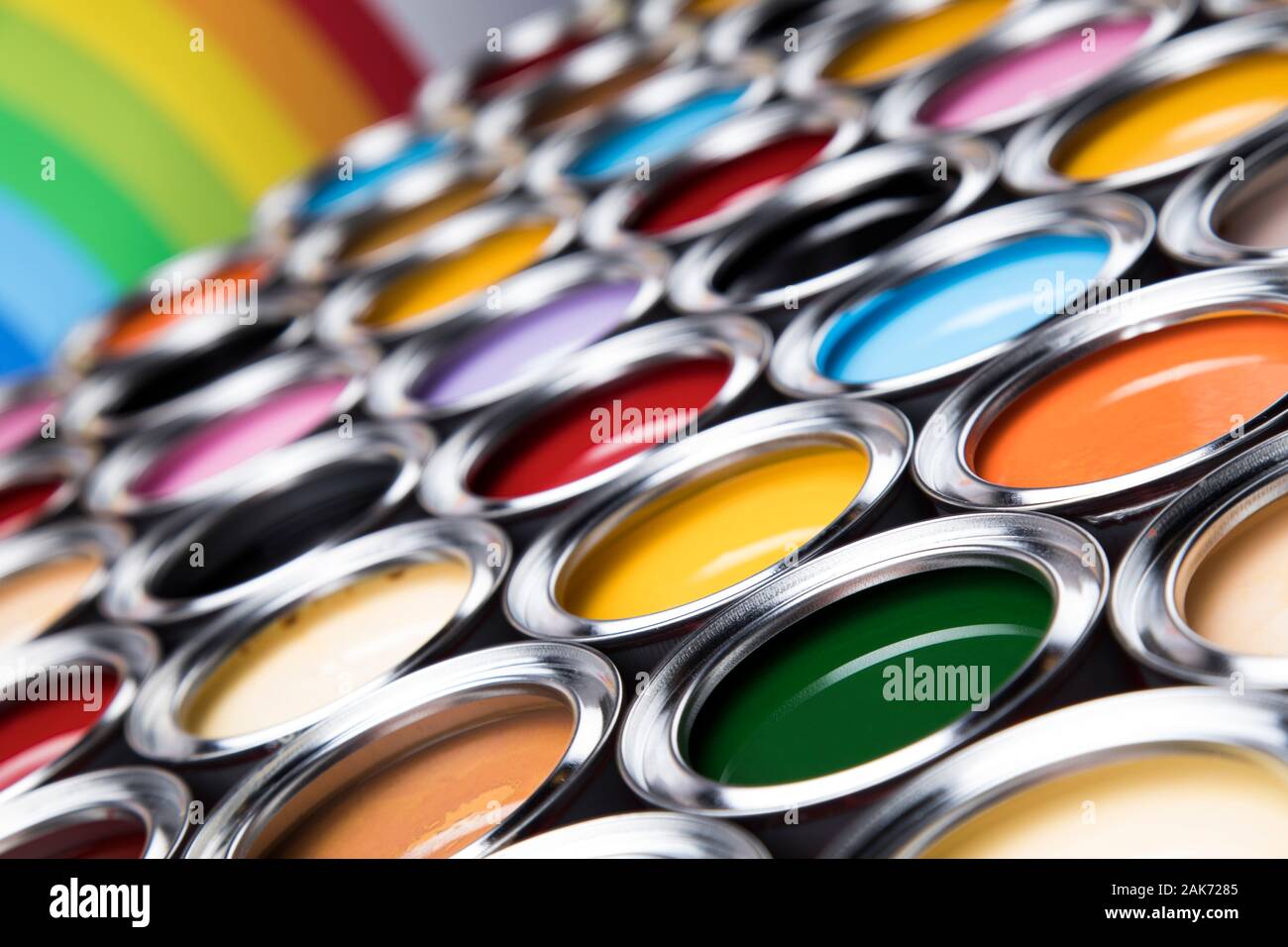 Group of tin metal cans with color paint Stock Photo - Alamy