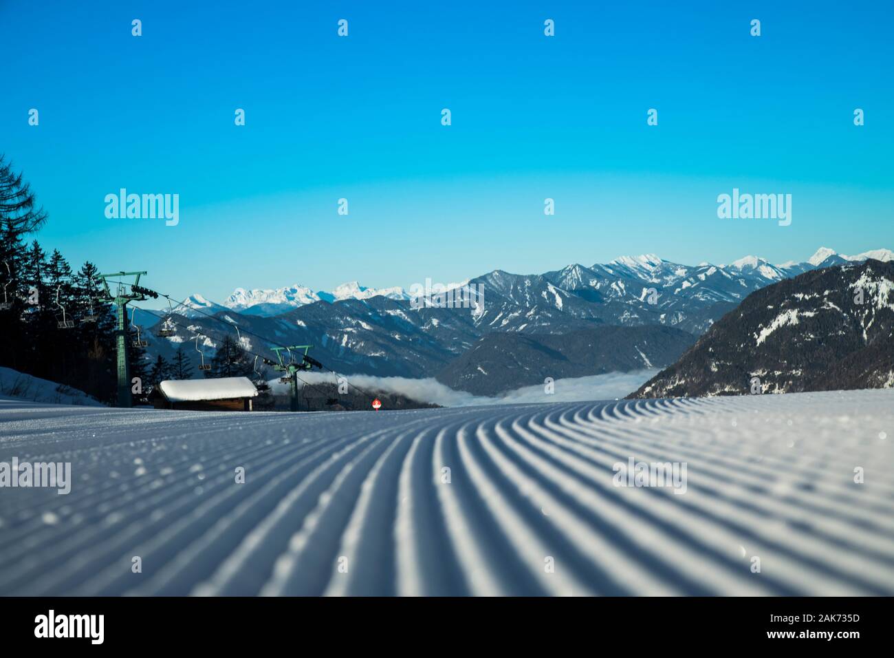 Winter mountains panorama with ski slope Stock Photo - Alamy