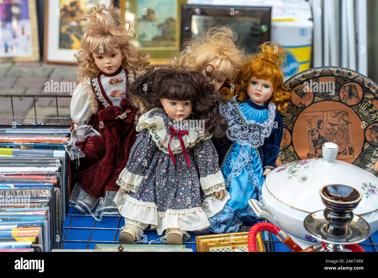 four dolls in flea market Stock Photo