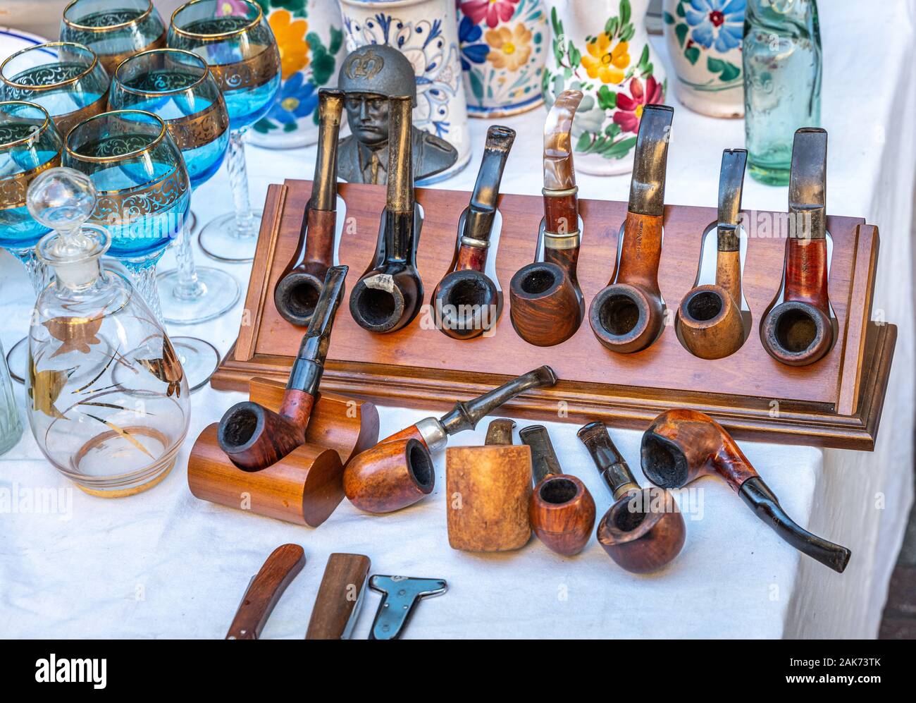 assortment of  pipes in flea market Stock Photo