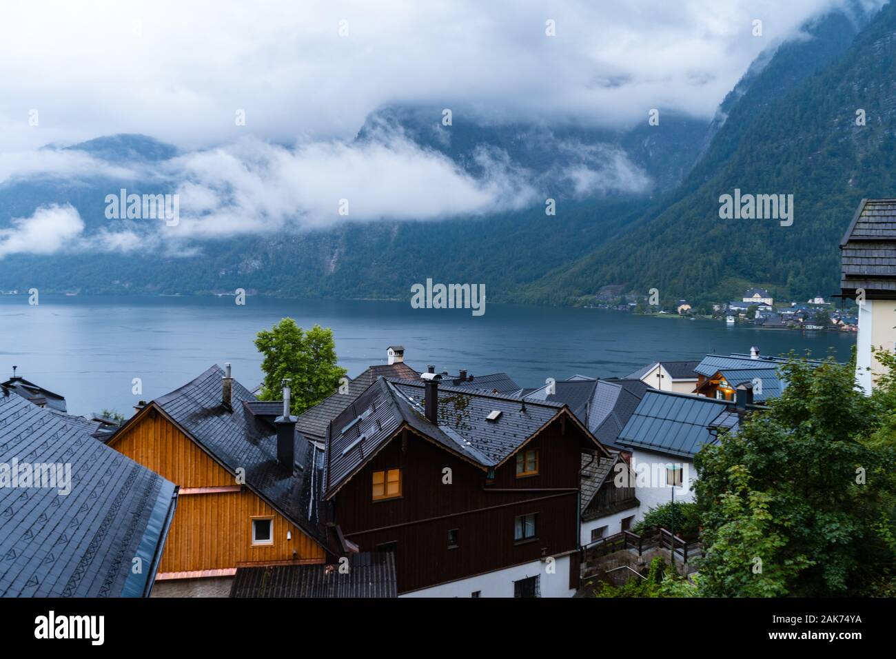 Cloudy blue hour in Hallstatt that is located in Austria. Perfect travel European travel destination for tourism from all over the world. Beautiful Stock Photo
