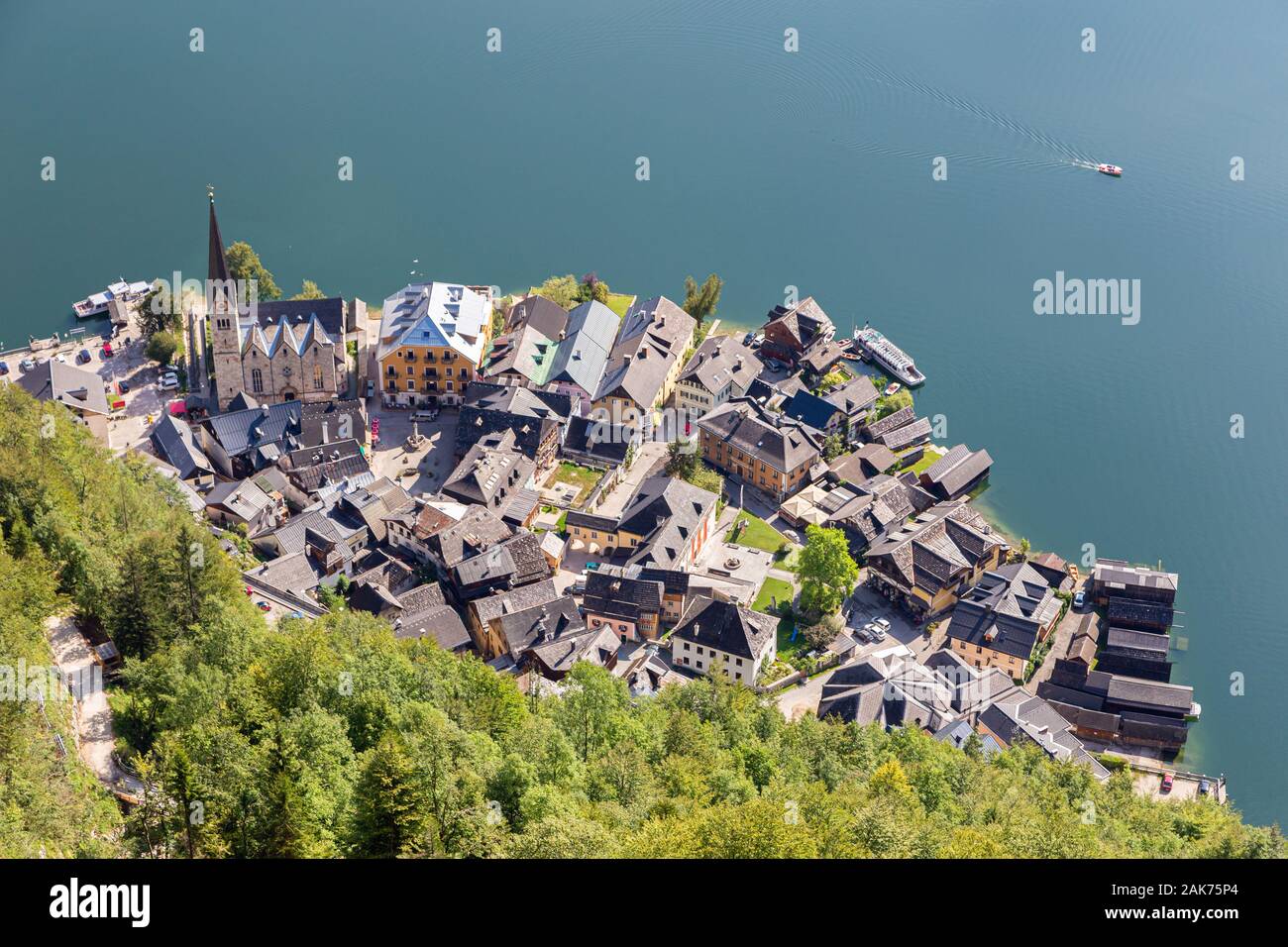 Aerial view from above on famous historical Hallstatt town on Hallstatter lake in austrian Alps. Scenic travel destination landscape. European landmar Stock Photo