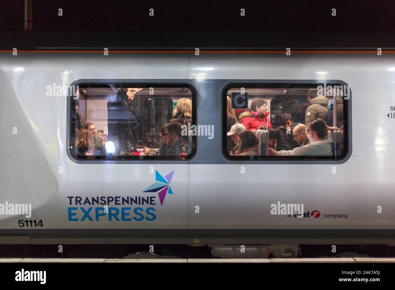 Passengers / commuters on a crowded Transpennine Express train operated by Firstgroup Stock Photo
