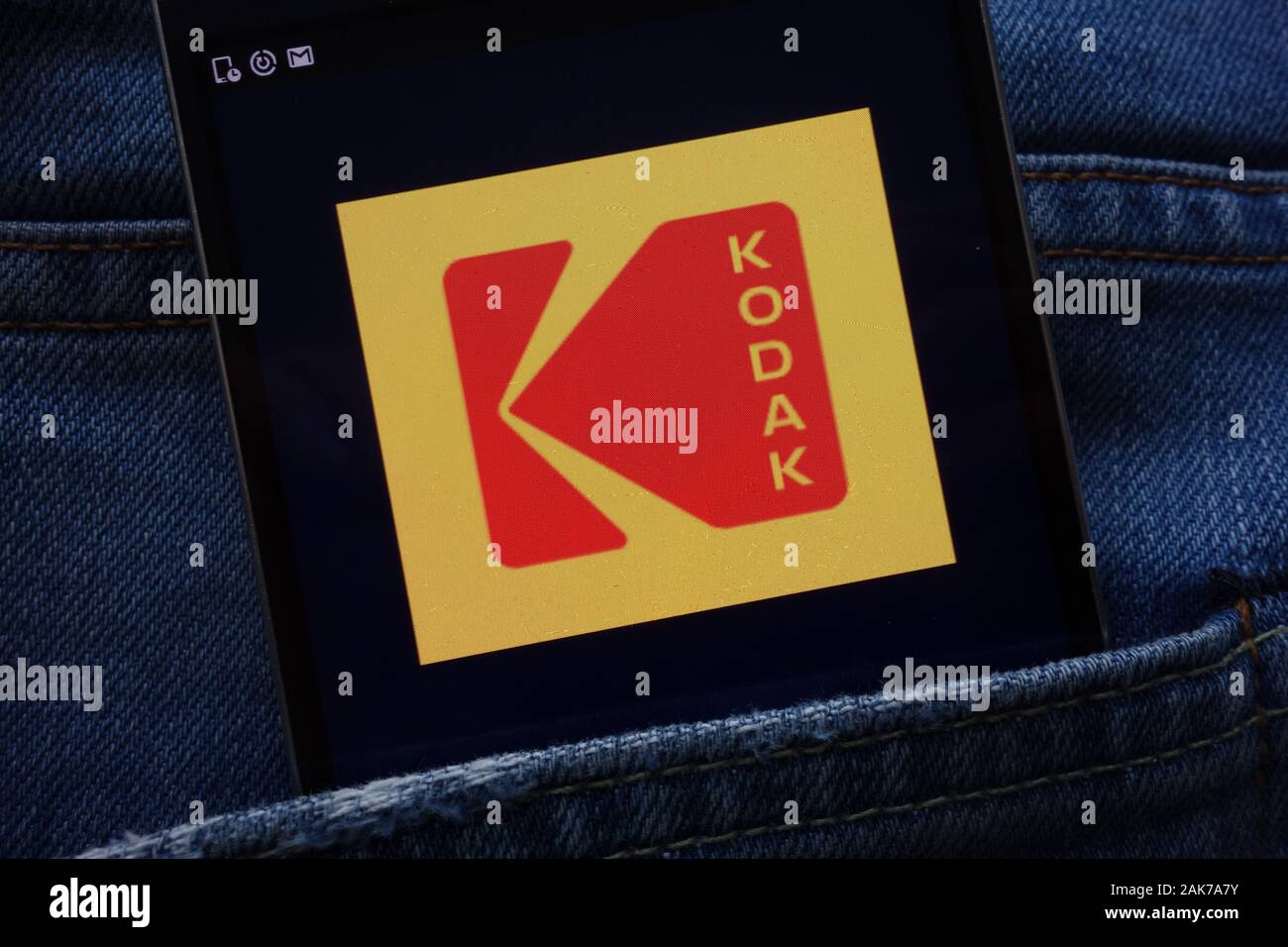 Eastman Kodak Company website displayed on smartphone hidden in jeans pocket Stock Photo