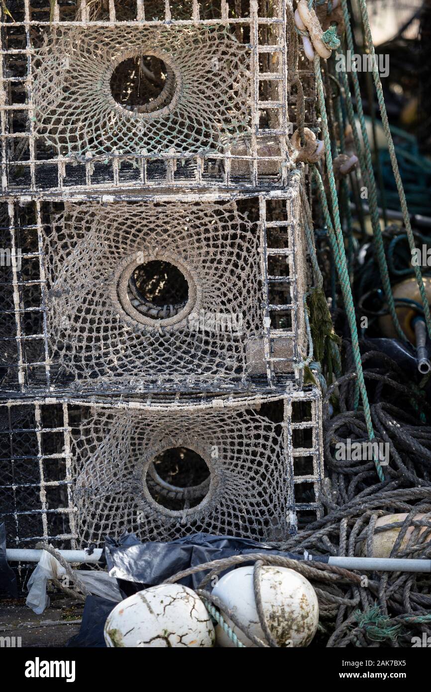 Lobster Traps and Buoys at Gourdon Harbour in Aberdeenshire, Scotland. Stock Photo