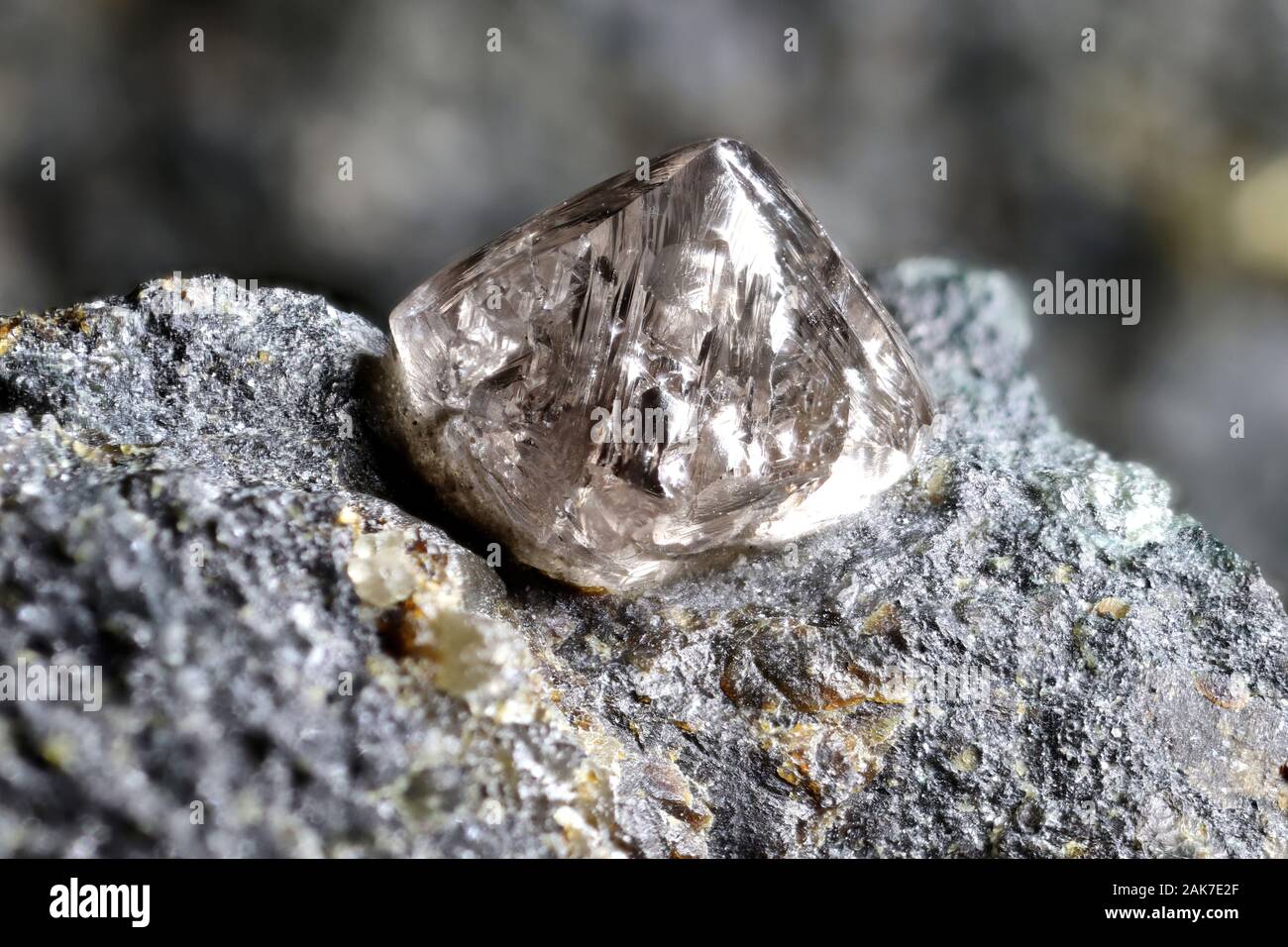 natural diamond nestled in kimberlite Stock Photo