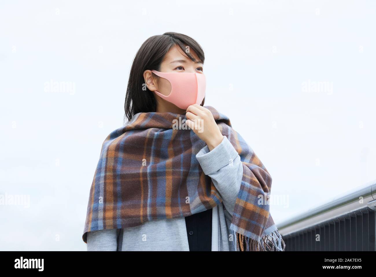 Gazing woman wearing mask hi-res stock photography and images - Alamy