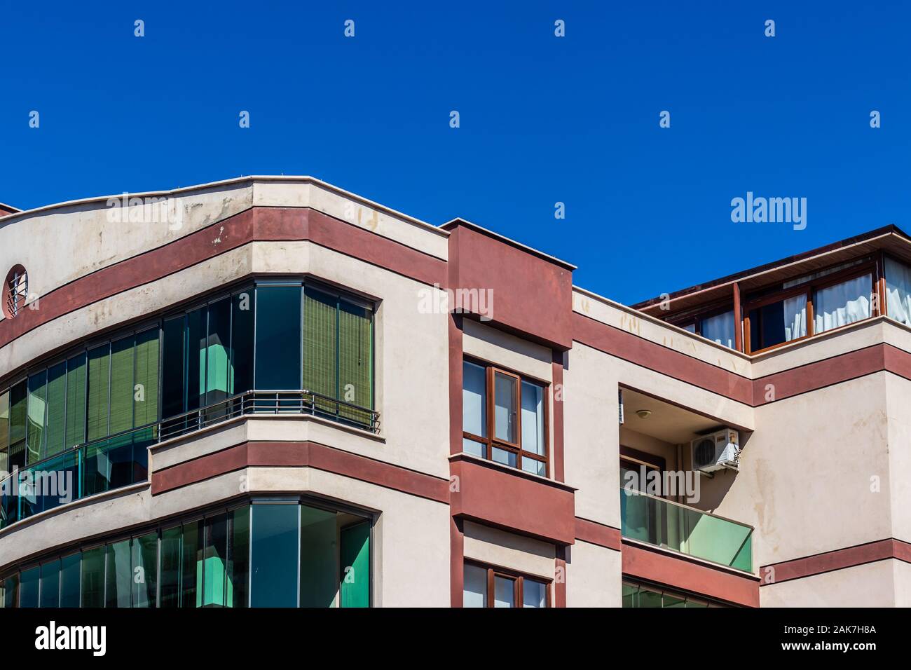 a well angled corner shoot from a modern building with red and white colors. photo has taken at izmir/turkey. Stock Photo