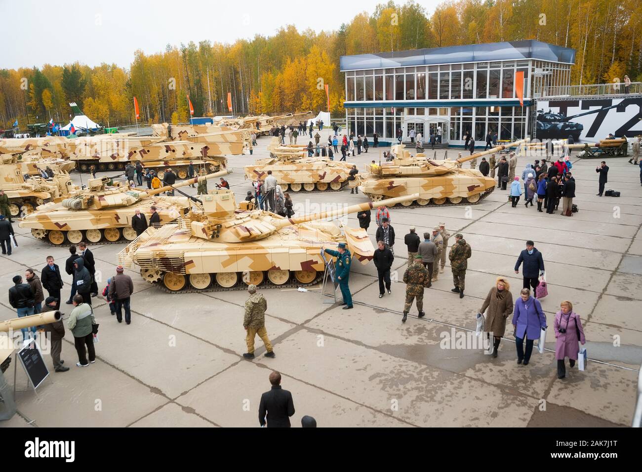 Visitors explore military vehicles on exhibition Stock Photo