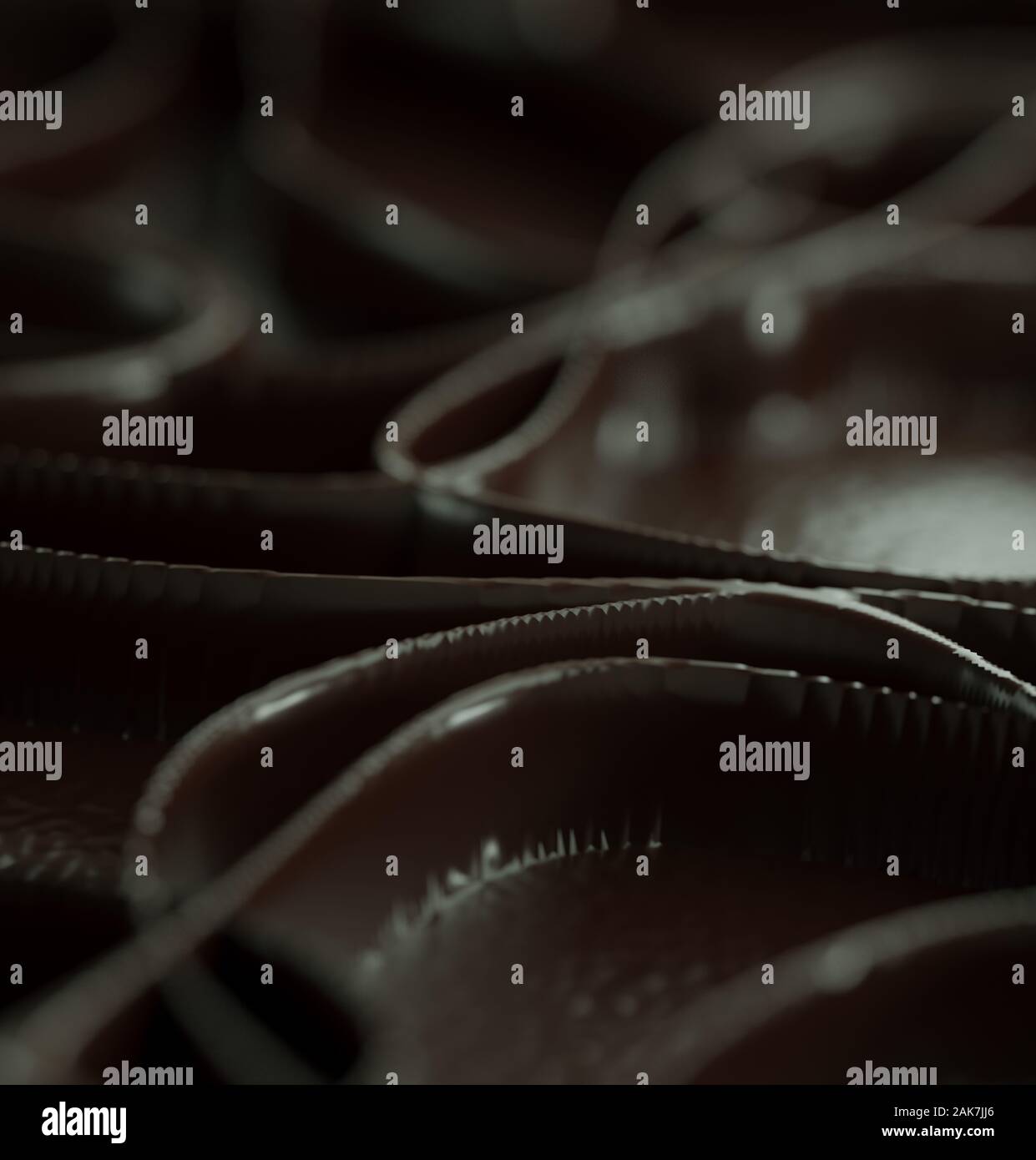 3D rendering of chocolate shells with blurred chocolate leaves on the ...