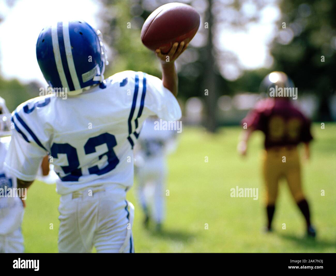 Young boys playing American Football Stock Photo Alamy