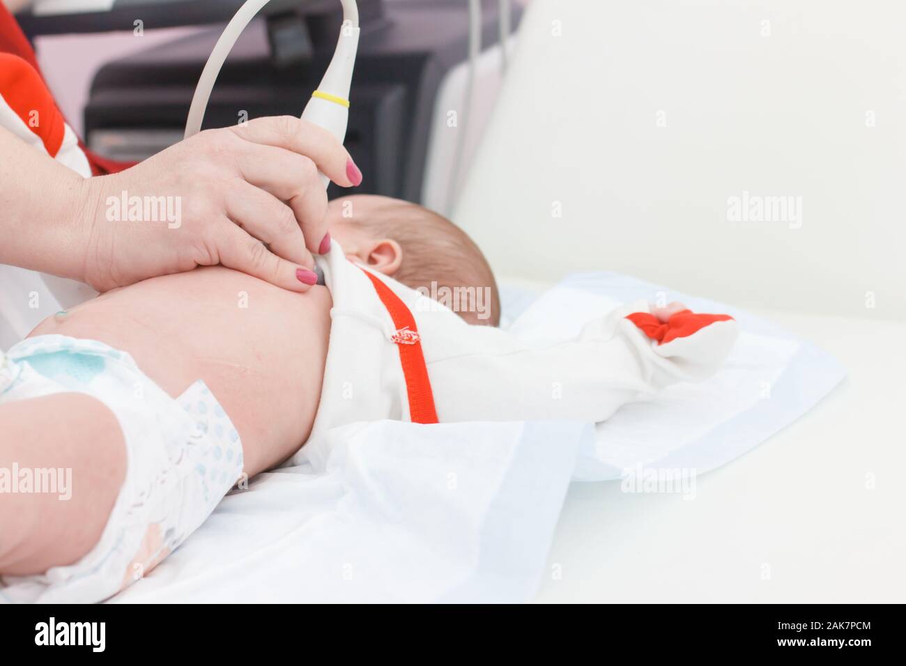 Ultrasound examination of the heart. Examination of a month old baby. Stock Photo