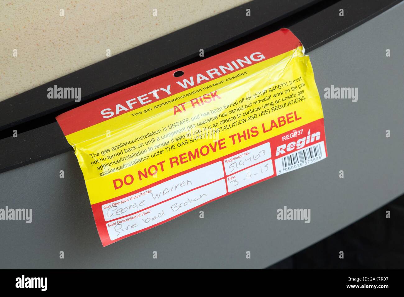 Gas safety warning on gas heater Stock Photo