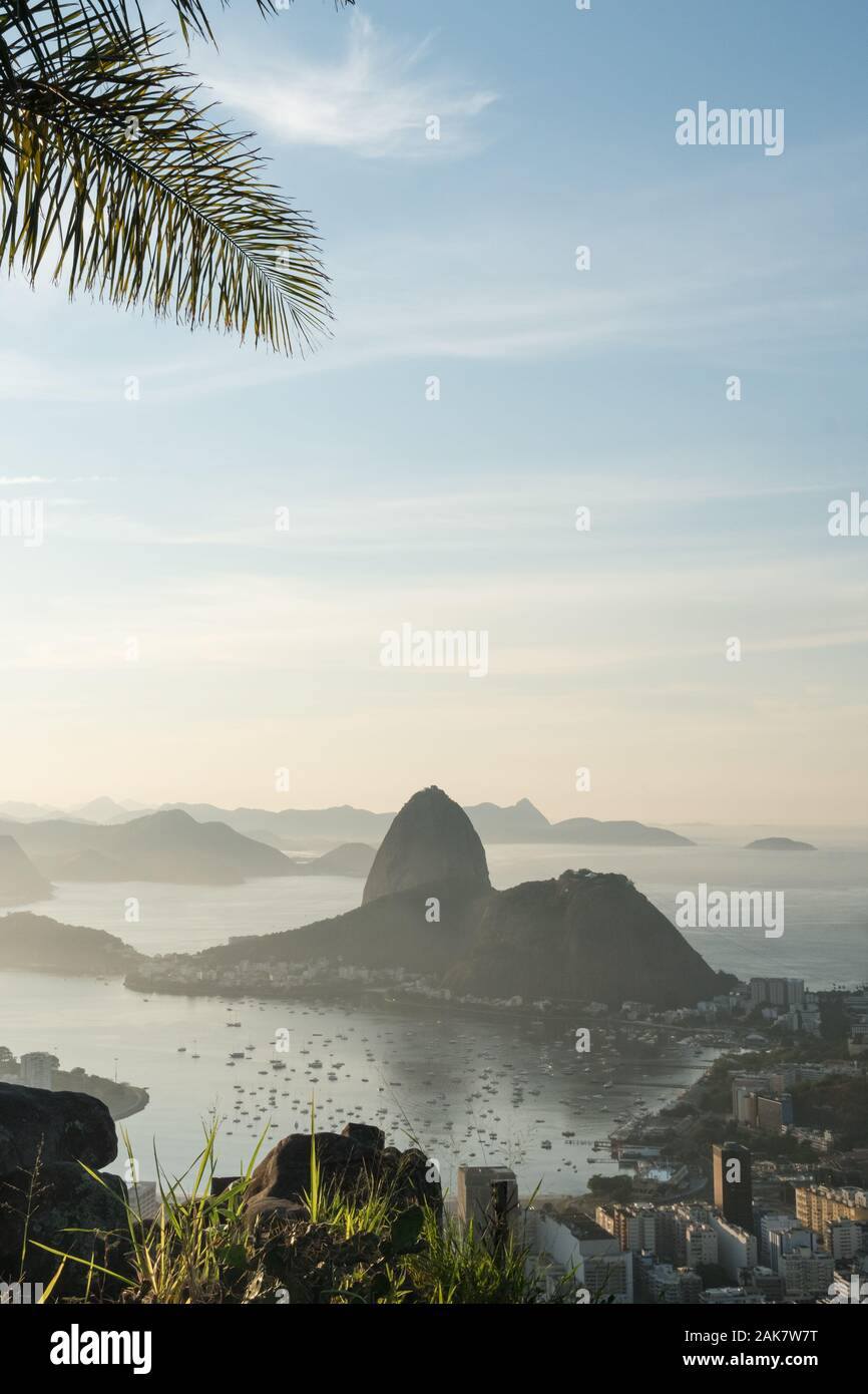 Sunrise view over Sugarloaf Mountain and Guanabara Bay from Mirante Dona Marta in Rio de Janeiro. Stock Photo