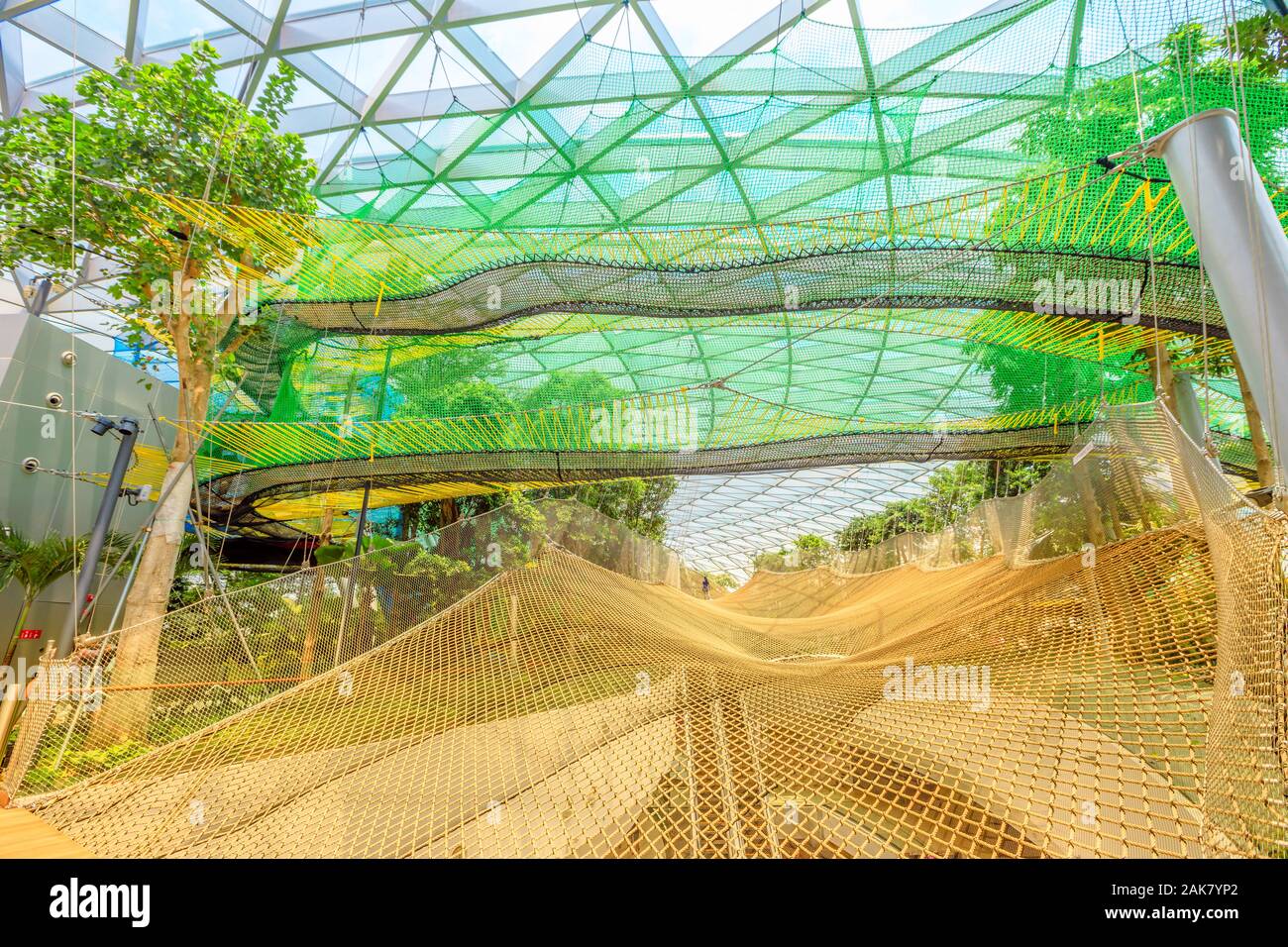 Singapore - Aug 8, 2019: Manulife Sky Nets Bouncing the most fun attraction in Canopy Park in Jewel Changi Airport, a nature-themed with gardens Stock Photo