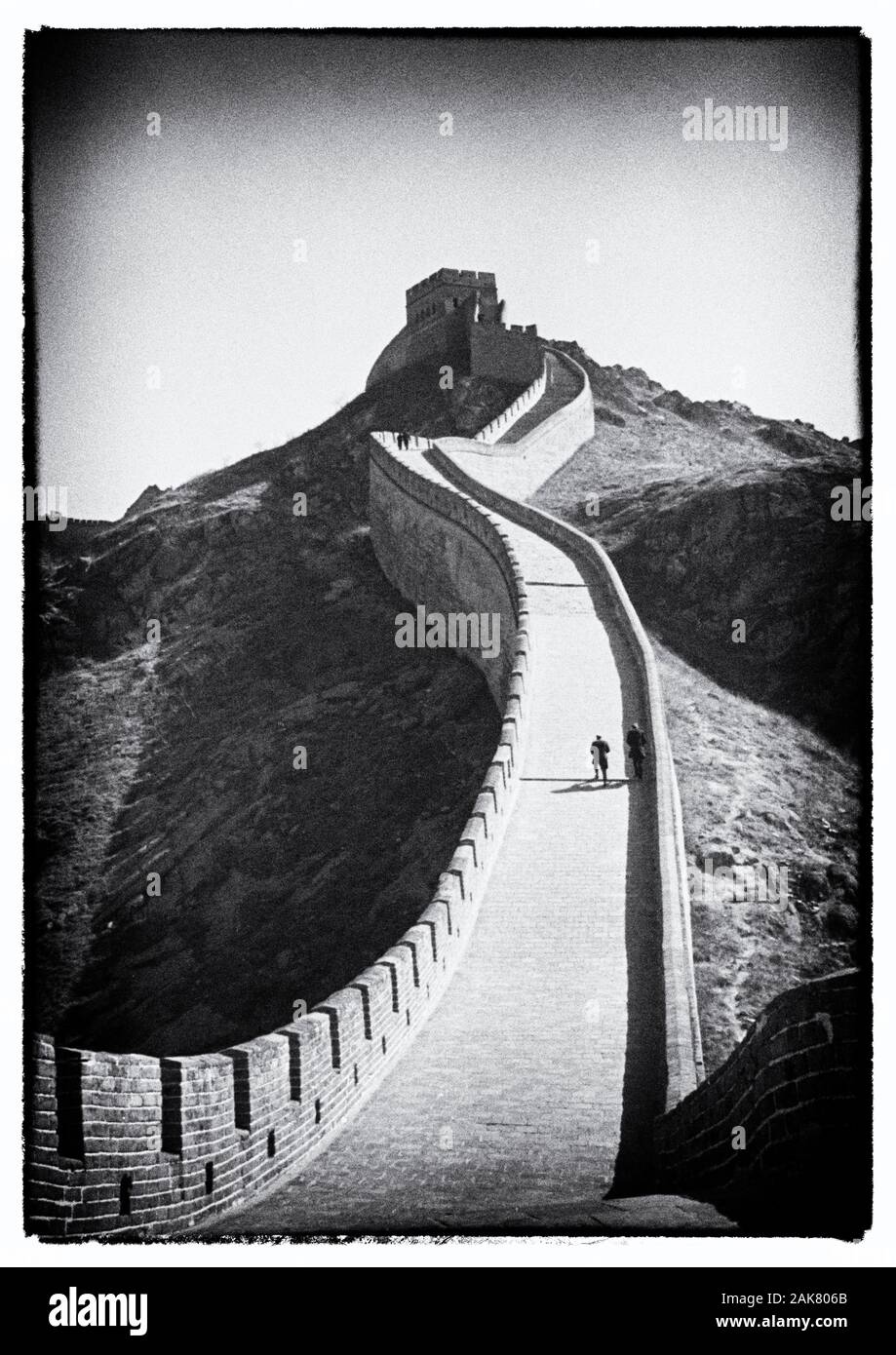 1955 B&W photo - The Great Wall of China (Chinese: 萬里長城; pinyin: Wànlǐ Chángchéng) is the collective name of a series of fortification systems generally built across the historical northern borders of China to protect and consolidate territories of Chinese states and empires against various nomadic groups of the steppe and their polities. Several walls were being built from as early as the 7th century BC by ancient Chinese states; selective stretches were later joined together by Qin Shi Huang (220–206 BC), the first Emperor of China. Stock Photo