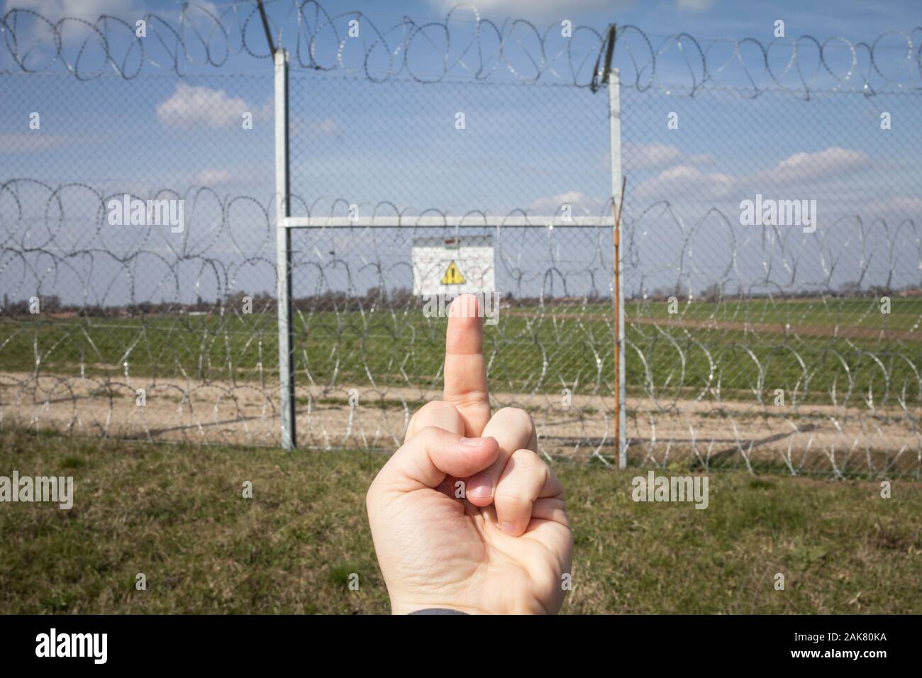 BACSSZENTGYORGY, HUNGARY - MARCH 19, 2019: Middle finger of a protestor ...