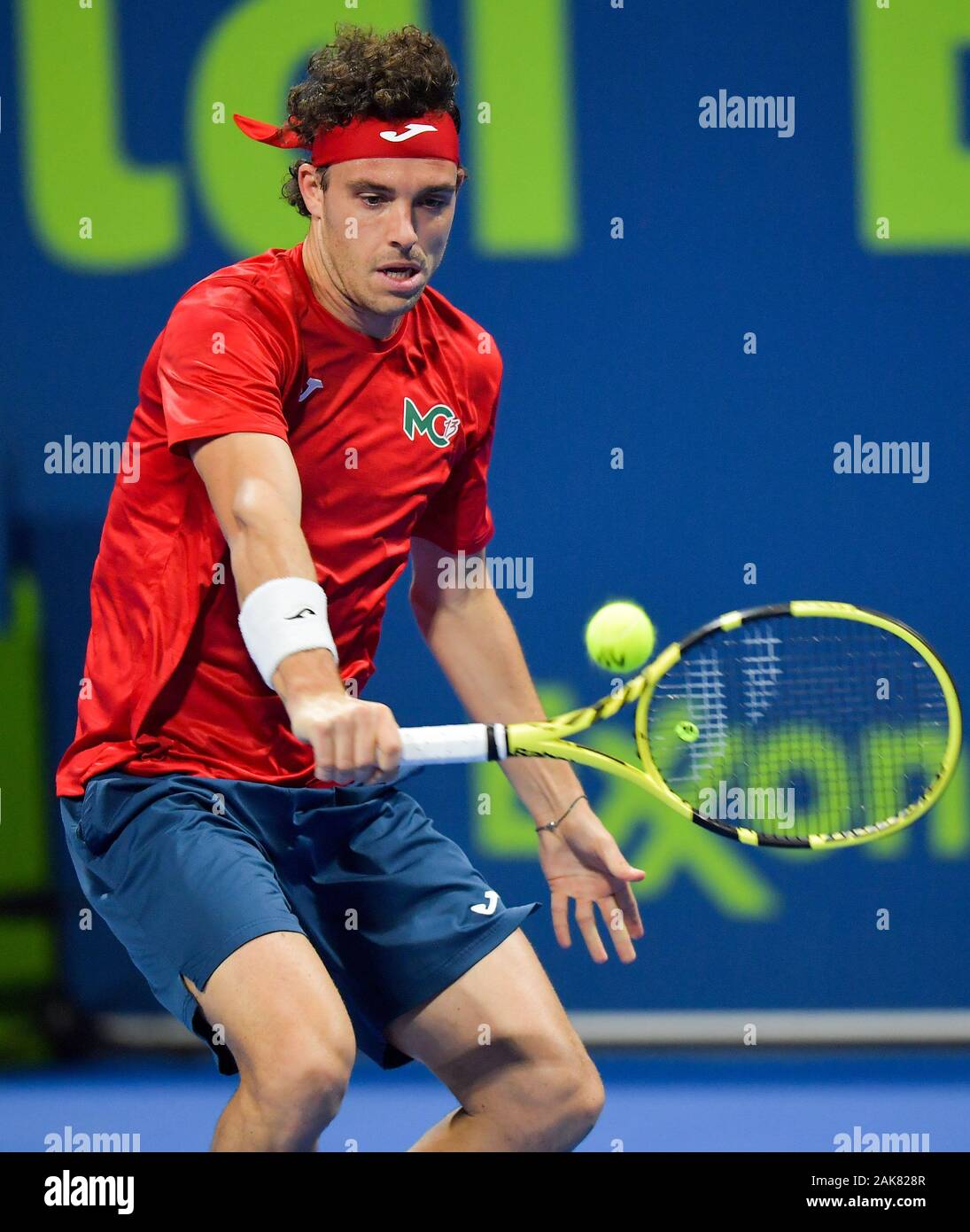 Doha, Qatar. 7th Jan, 2020. Marco Cecchinato of Italy returns the ball  during the first round match against Pierre-Hugues Herbert of France at the  ATP Qatar Open tennis tournament at the Khalifa