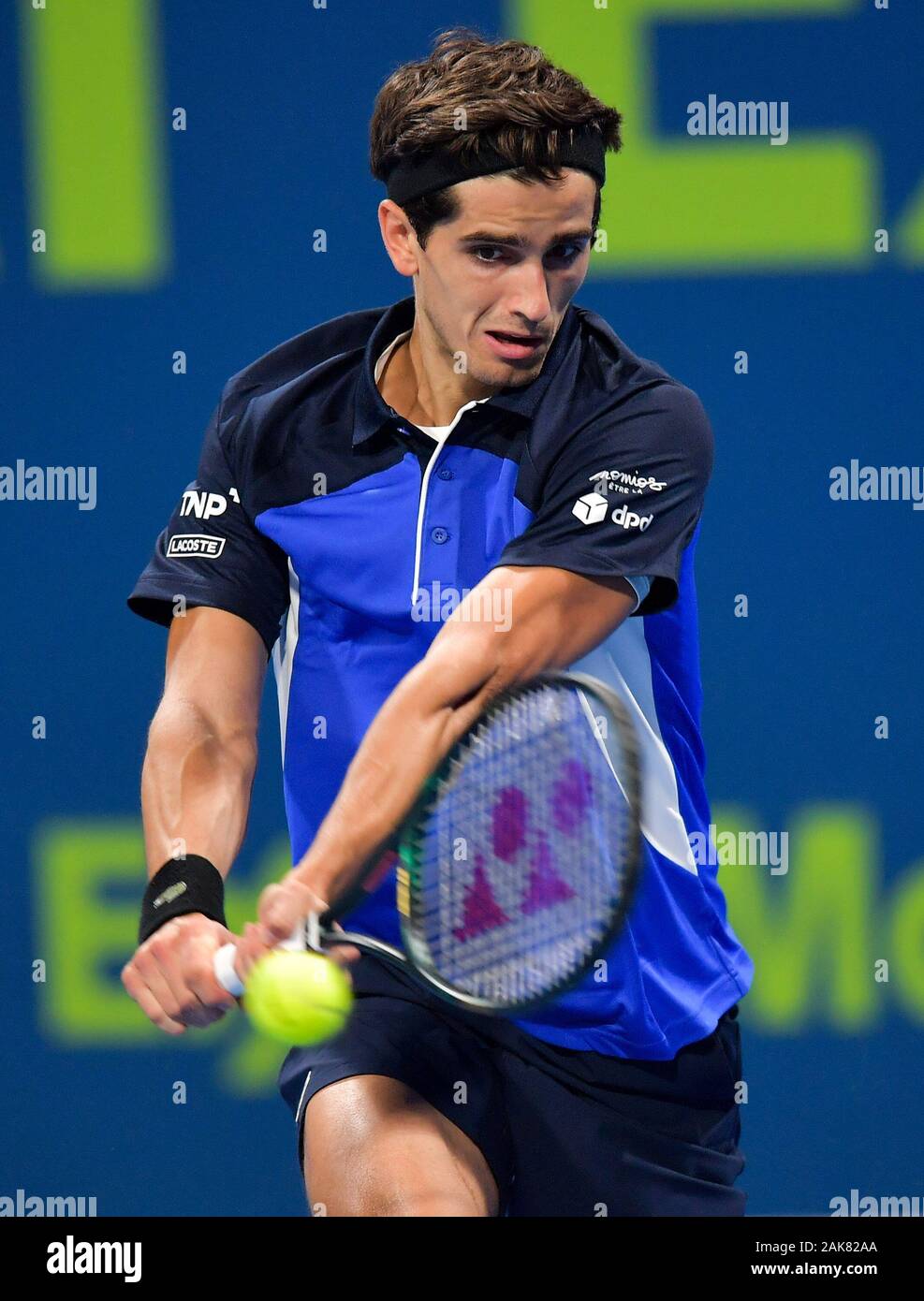 Doha. 7th Jan, 2020. Pierre-Hugues Herbert of France returns the ball  during the first round match against Marco Cecchinato of Italy at the ATP  Qatar Open tennis tournament at the Khalifa International