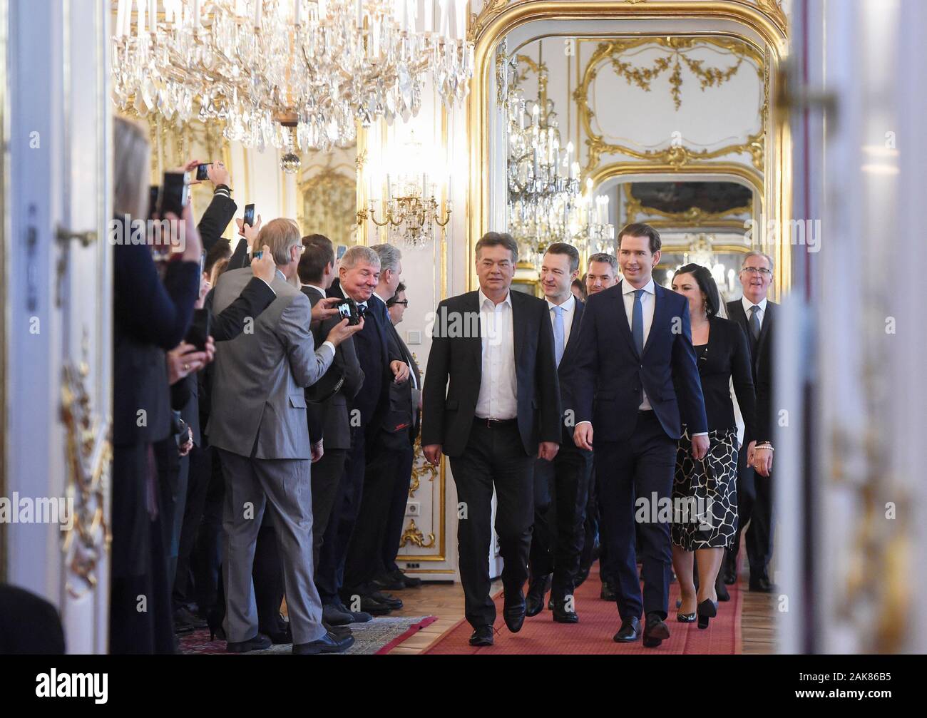 Beijing, Autstria. 7th Jan, 2020. Austria's new Chancellor Sebastian Kurz (1st R Front) and new Vice Chancellor Werner Kogler (2nd R Front) enter the swearing-in ceremony in Vienna, Autstria, Jan. 7, 2020. Austria's new coalition government was sworn in on Tuesday. Credit: Guo Chen/Xinhua/Alamy Live News Stock Photo