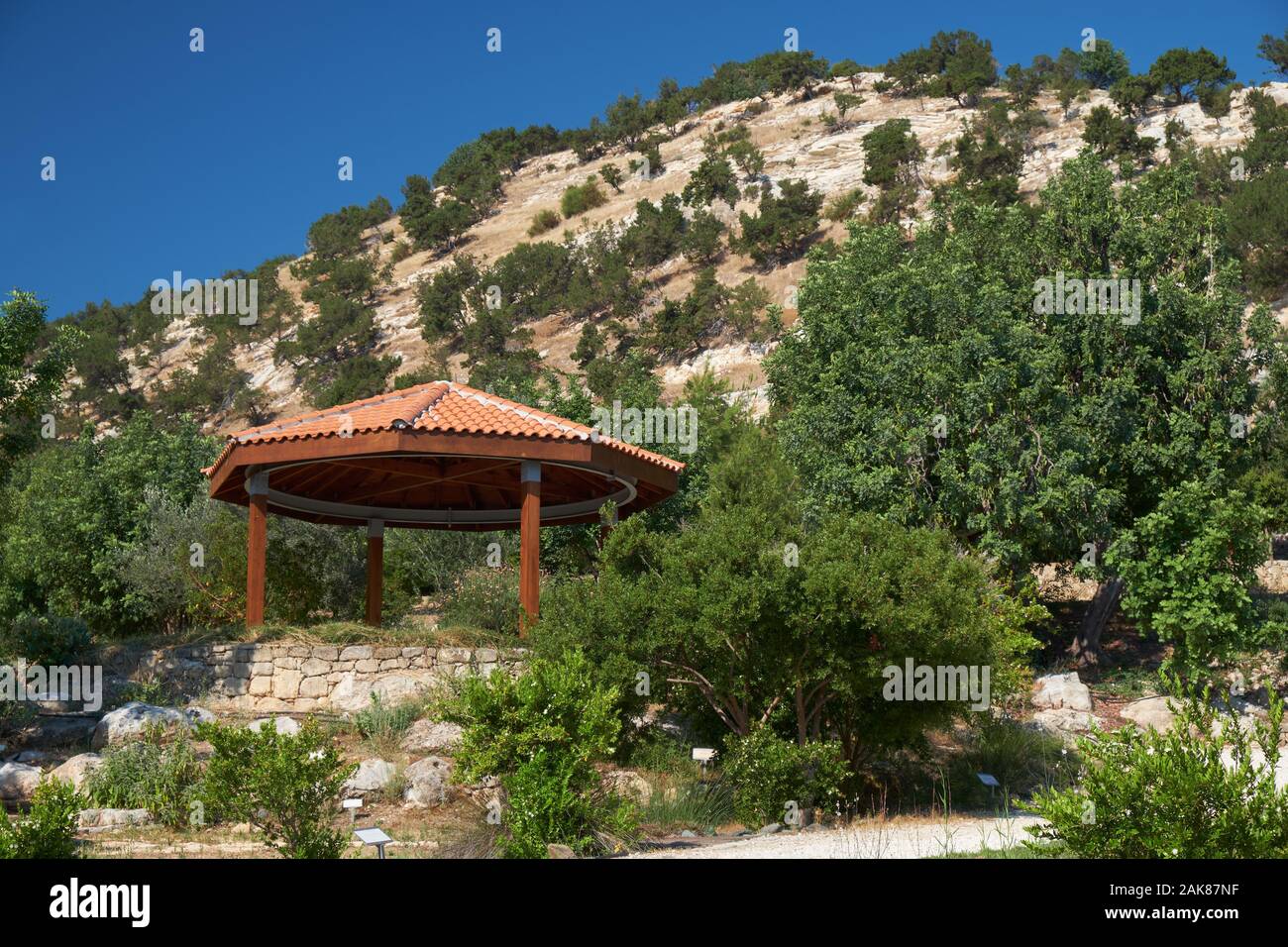 LATCHI, CYPRUS - JUNE 07, 2018: The view of pavilion in the Botanical garden with Baths of Aphrodite  near village of Latchi on Akamas Peninsula.  Cyp Stock Photo