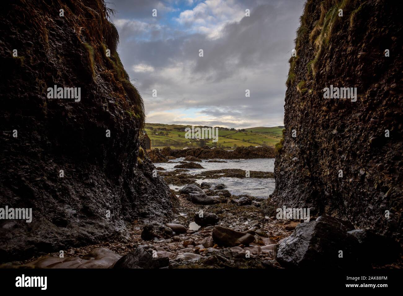 Cushendun Cave in Northern Ireland, county of Antrim, which was used as a filming location in Game of Thrones TS series. Stock Photo