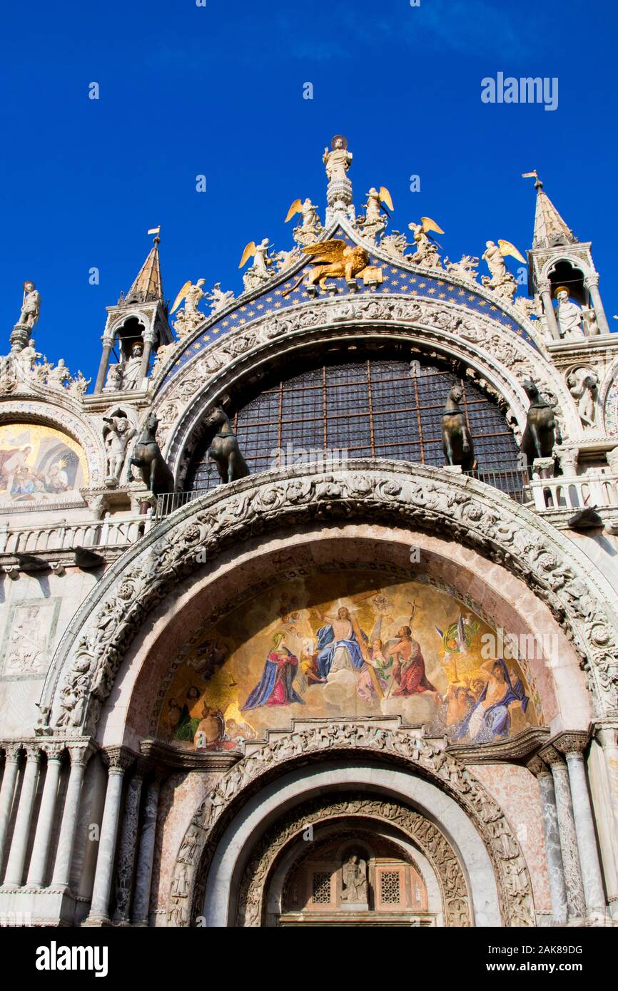 The facade of St Marks Basilica featuring The Last Judgement fresco in Venice Italy Stock Photo