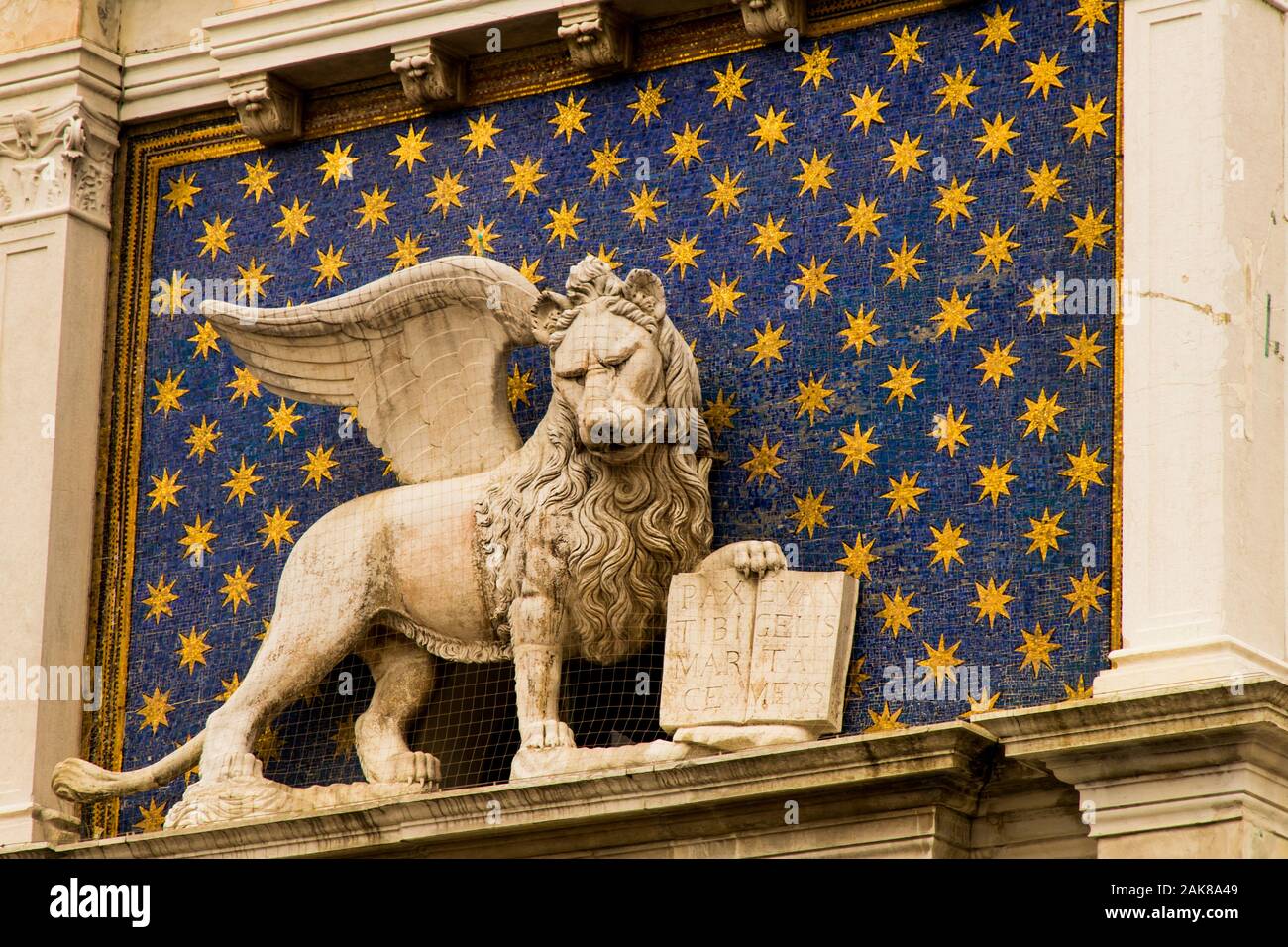 The Lion of St Mark also known as the Winged Lion on the Torre dell'Orologio is a symbol of Venice Italy Stock Photo