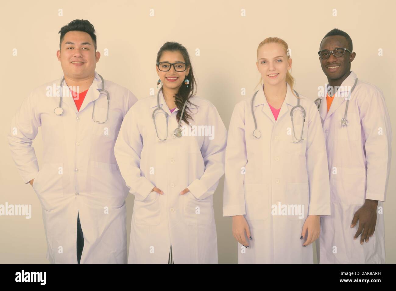 Portrait group smiling doctors hi-res stock photography and images - Alamy