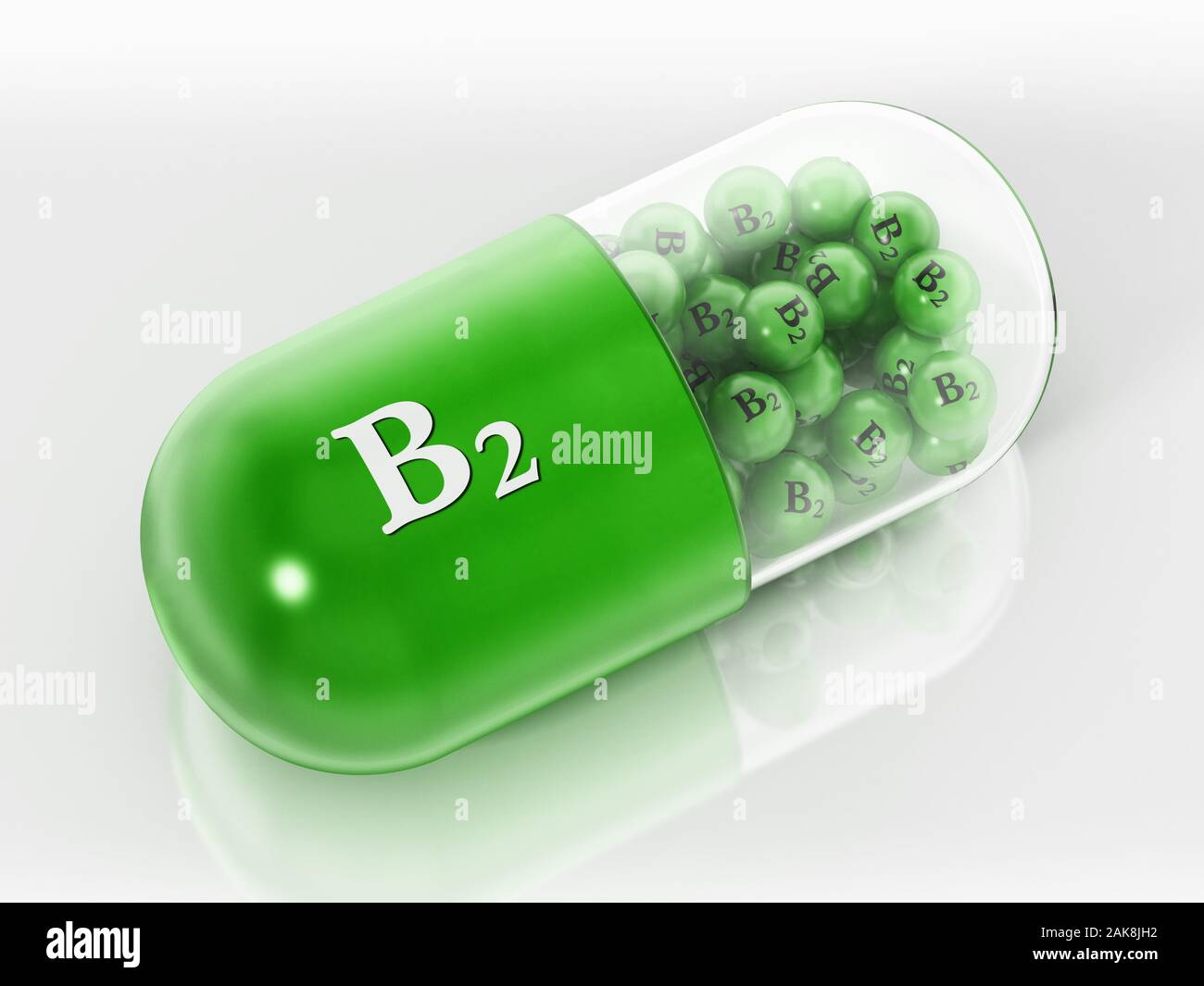 Vitamin B2 pill with small spheres isolated on white background. 3D illustration. Stock Photo