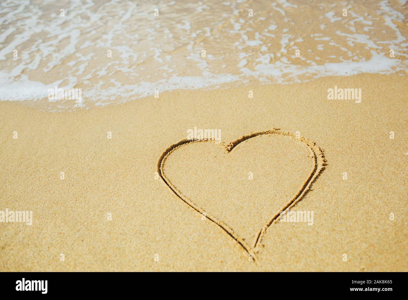 Heart shape draw on sandy beach. Love concept Stock Photo - Alamy Heart shape draw on sandy beach. Love concept Stock Photo - Alamy