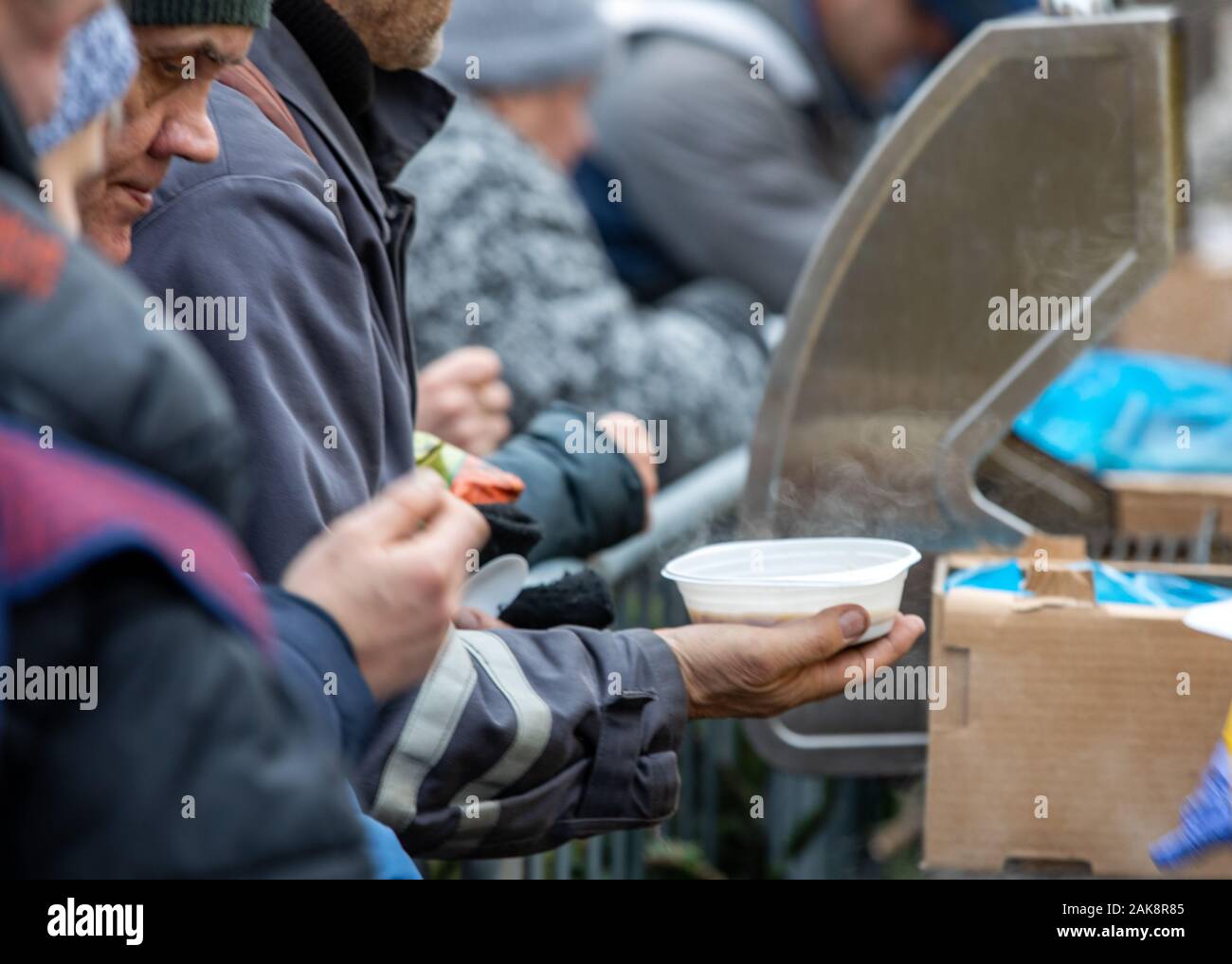 Warm food for the poor and homeless Stock Photo - Alamy