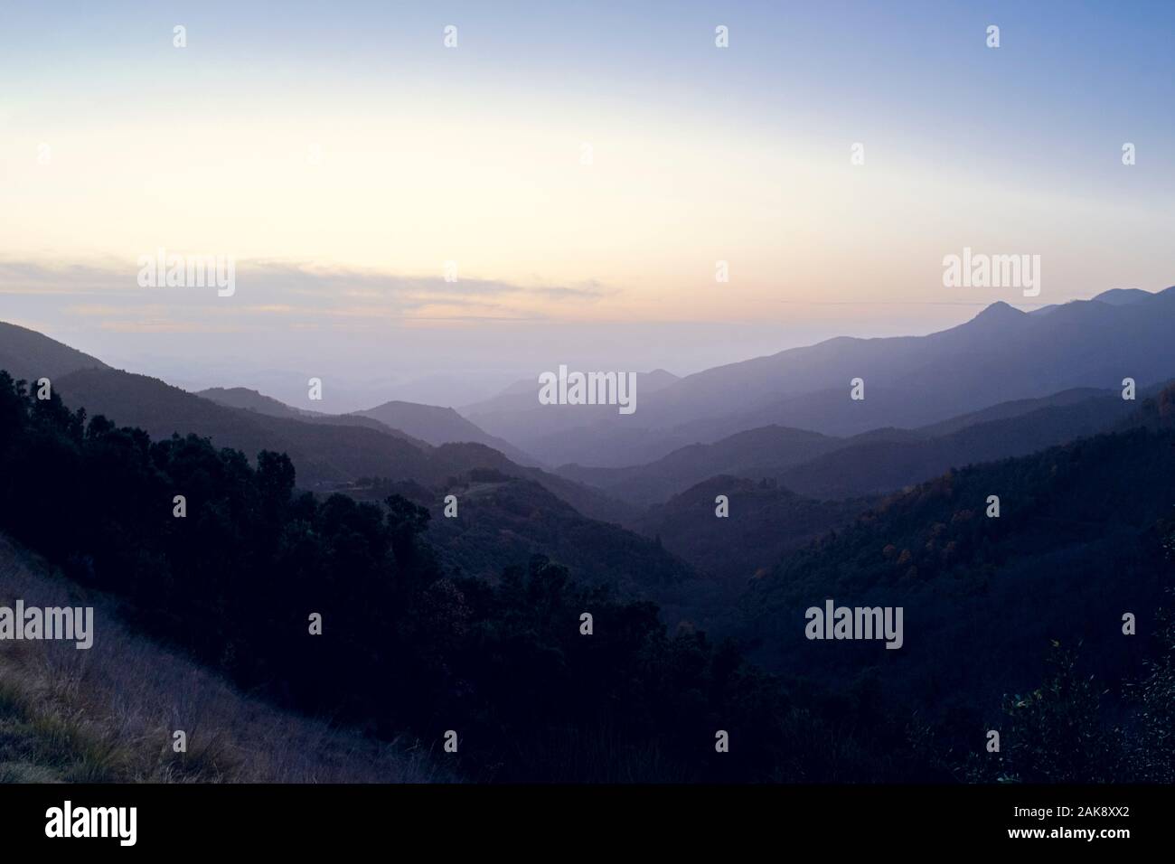 Foggy mountain landscape at sunrise hi-res stock photography and images ...