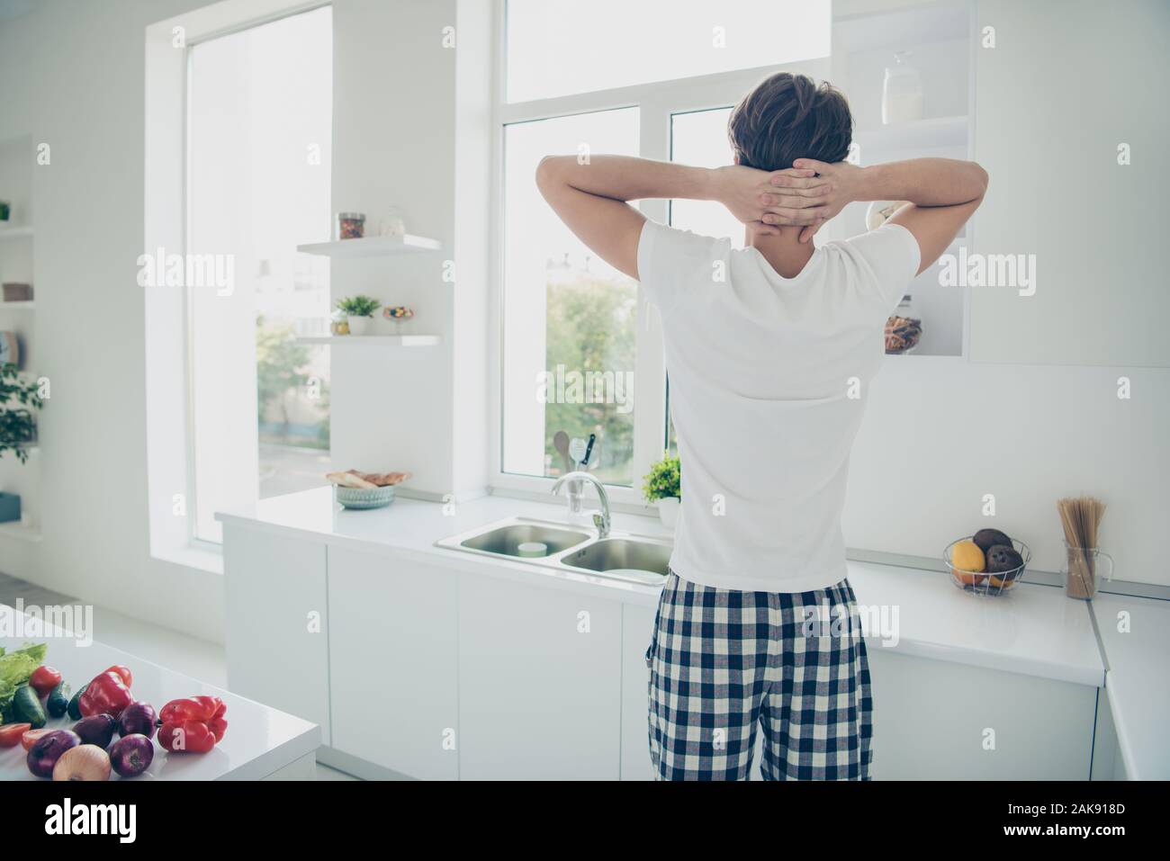 Rear back behind view portrait of his he nice attractive guy having ...