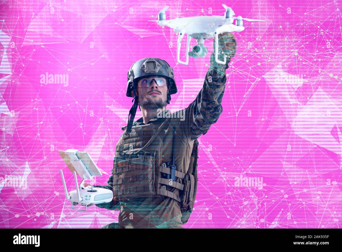 modern warfare soldier as drone control technician WITH GLITCH COMPUTER ERROR EFFECT Stock Photo