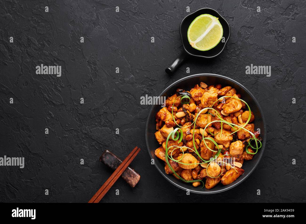 Kung Pao Chicken or Gong Bao Ji Ding at dark slate background. Sichuan