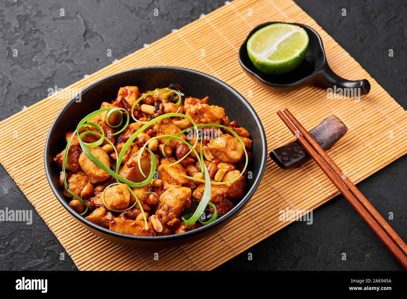 Kung Pao Chicken or Gong Bao Ji Ding at dark slate background. Sichuan