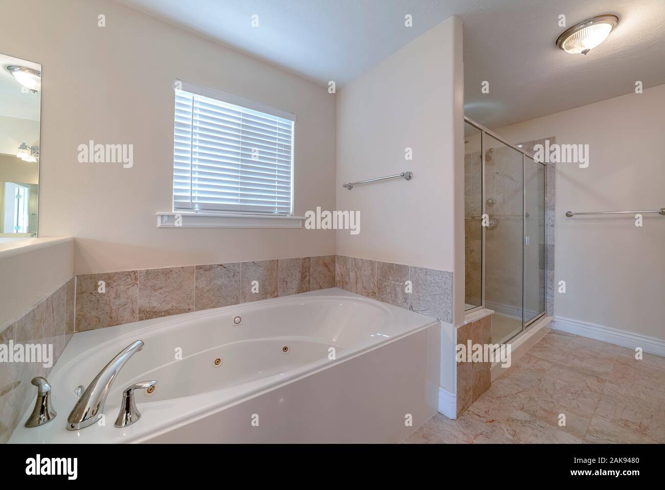 Modern luxury fitted bathroom interior in home Stock Photo