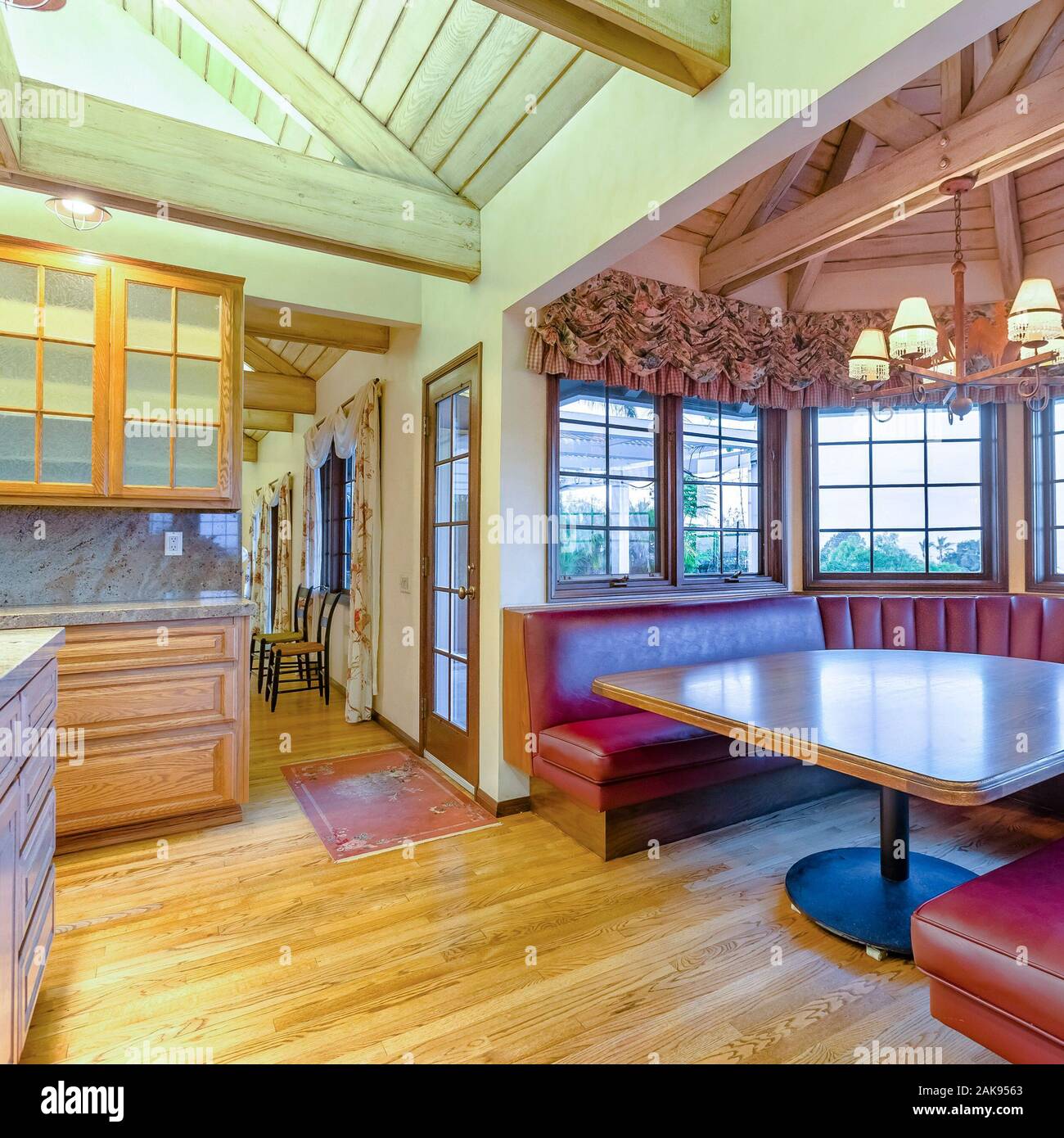 Square Frame Bright Open And Warm Kitchen With Vaulted Ceilings