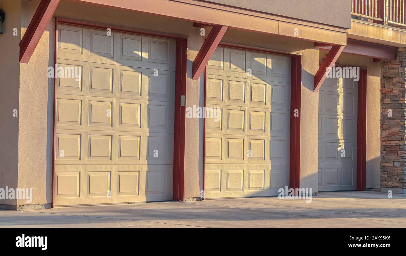 Panorama Frame White Panelled Wooden Garage Doors Near Sunset