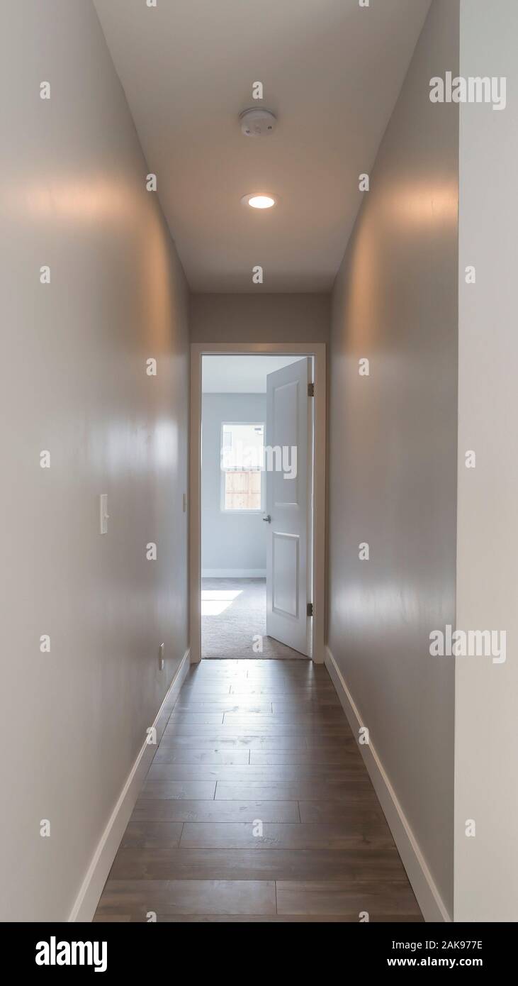 Vertical Dark hallway going to the master bedroom Stock Photo Alamy