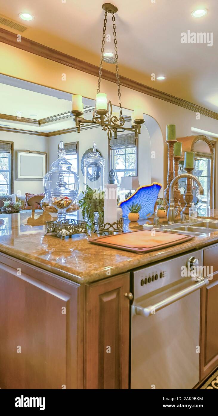 A luxurious white and blue kitchen with gold hardware, Bosch and Samsung  stainless steel appliances, and white marbled granite counter tops Stock  Photo - Alamy