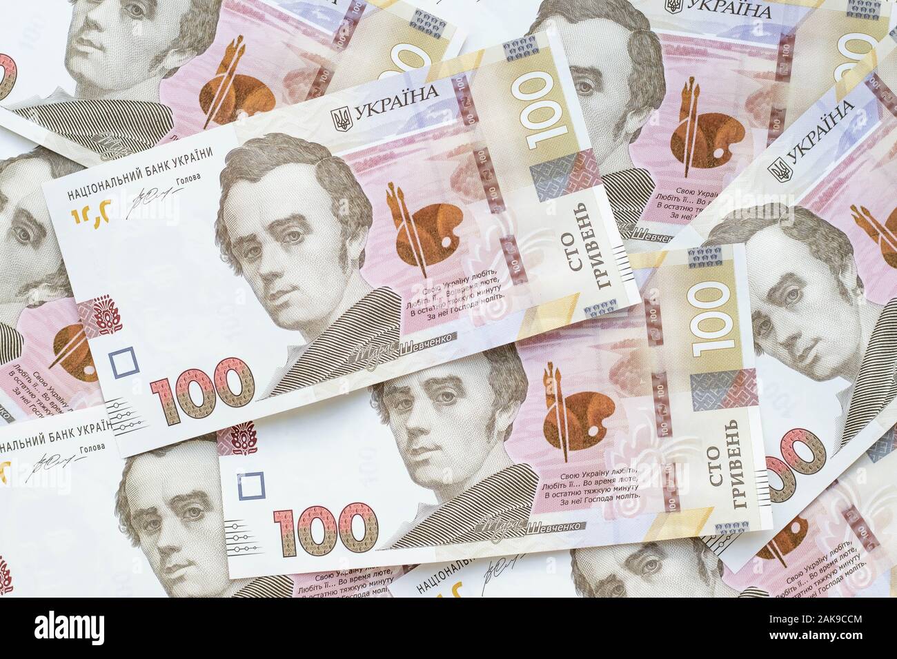 Pile of paper banknotes of Ukrainian money, uah. Cash of hryvnia, face value of one hundred Stock Photo