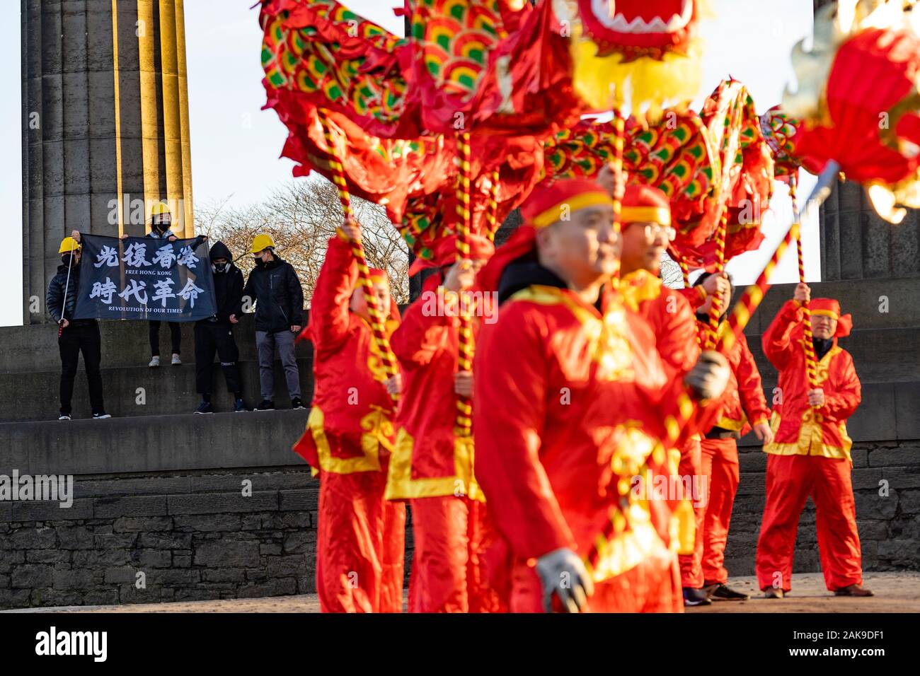 Edinburgh, Scotland, UK. 8th Jan 2020. Hong Kong pro democracy supporters stage demonstration during official Chinese New Year dragon dance event on Calton Hill in Edinburgh. The protest occurred during official photo call to mark start of Chinese New Year and the Year of the Rat. Iain Masterton/Alamy Live News Stock Photo