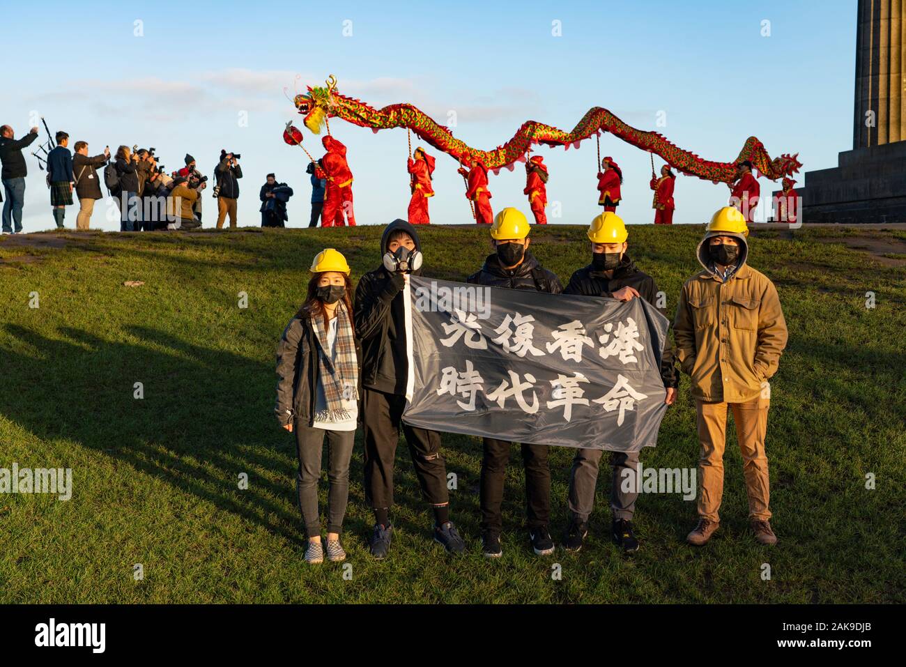 Edinburgh, Scotland, UK. 8th Jan 2020. Hong Kong pro democracy supporters stage demonstration during official Chinese New Year dragon dance event on Calton Hill in Edinburgh. The protest occurred during official photo call to mark start of Chinese New Year and the Year of the Rat. Iain Masterton/Alamy Live News Stock Photo