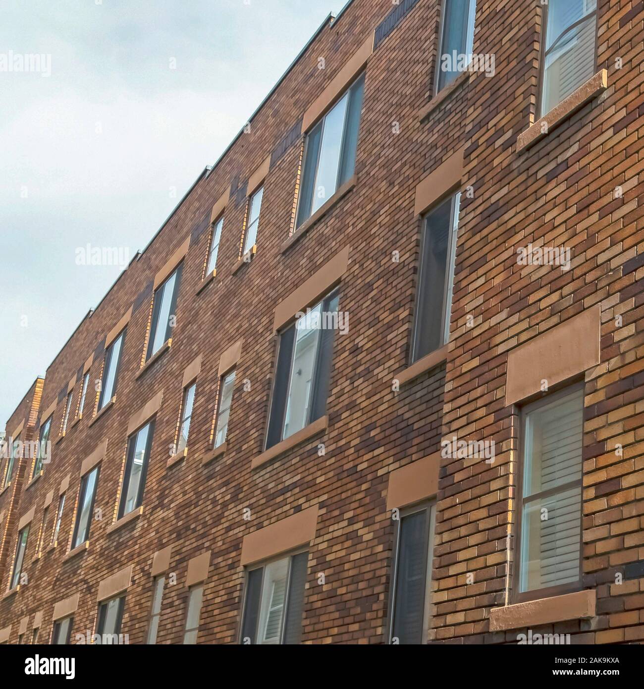 Square frame Exterior of an old classic building with brick wall and ...