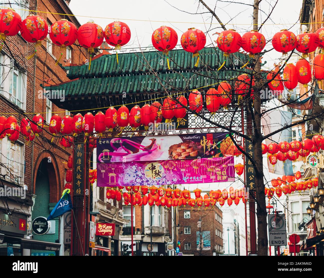 London, UK/Europe; 20/12/2019: Chinese gate and red lanterns in Chinatown, district of Soho in London Stock Photo