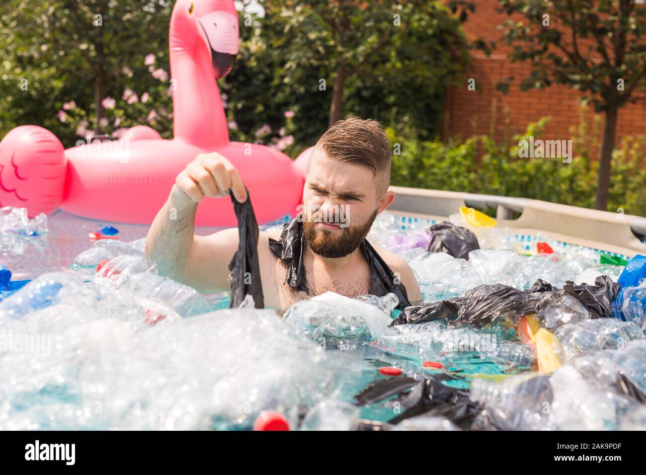 Ecology, plastic trash, environmental emergency and water pollution