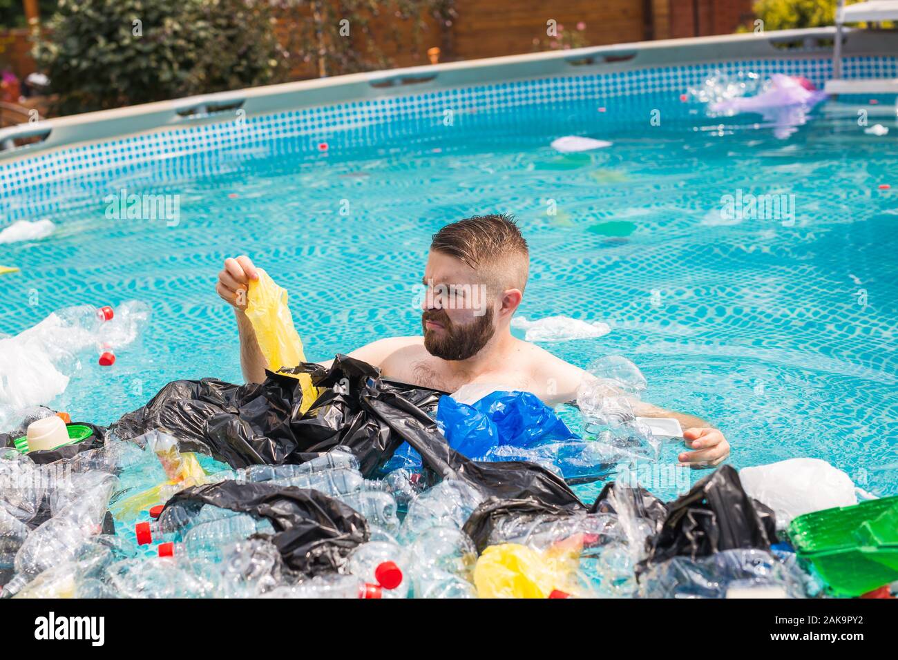 Ecology, plastic trash, environmental emergency and water pollution