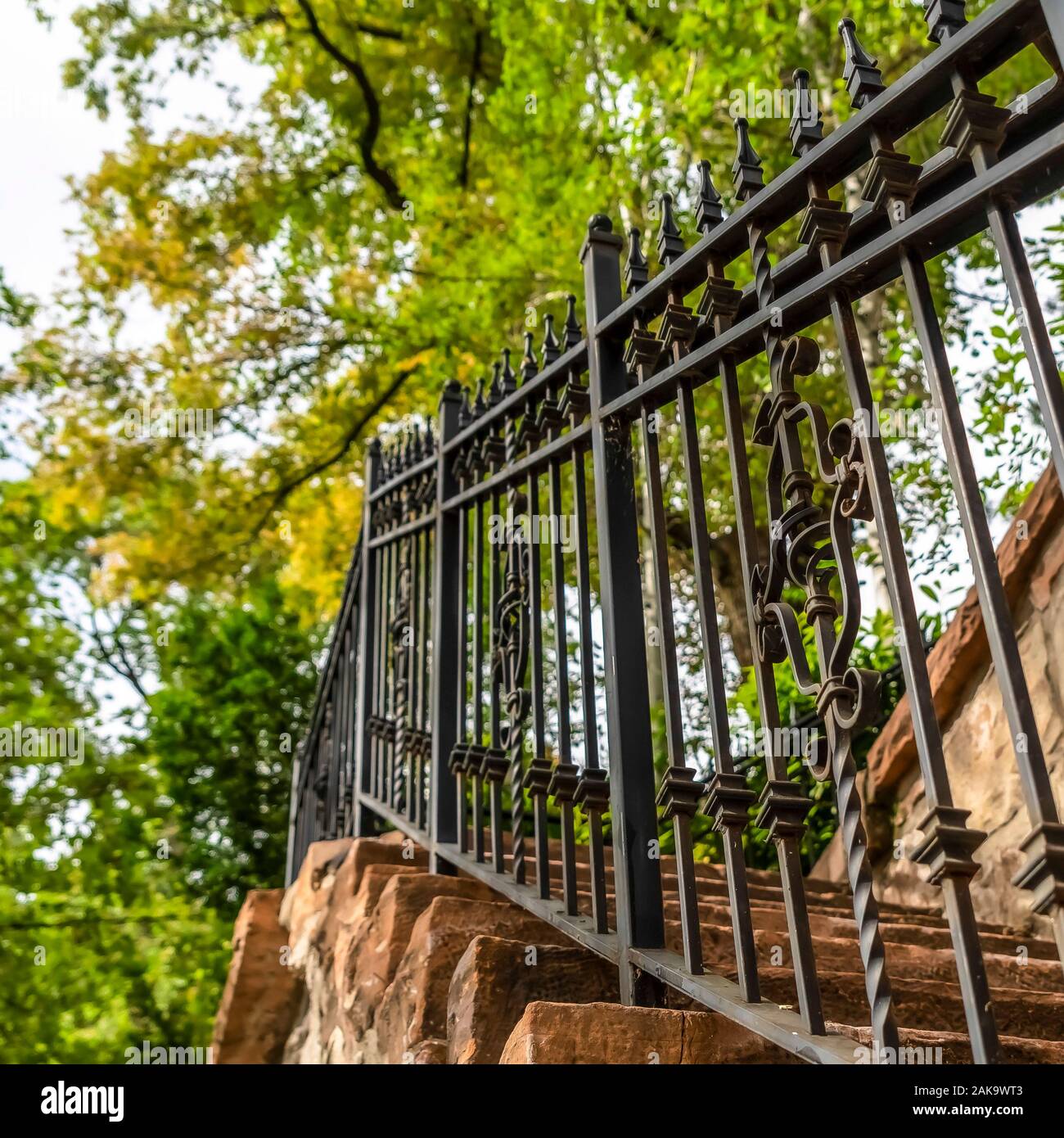 Square Close up of metal railing and stone treads of a staircase ...